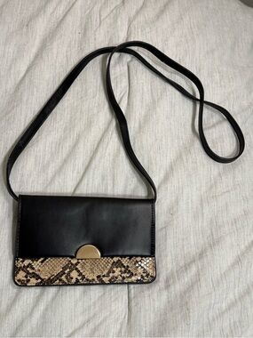 a new day Black Crossbody with Snake-Print Trim and Gold Clasp